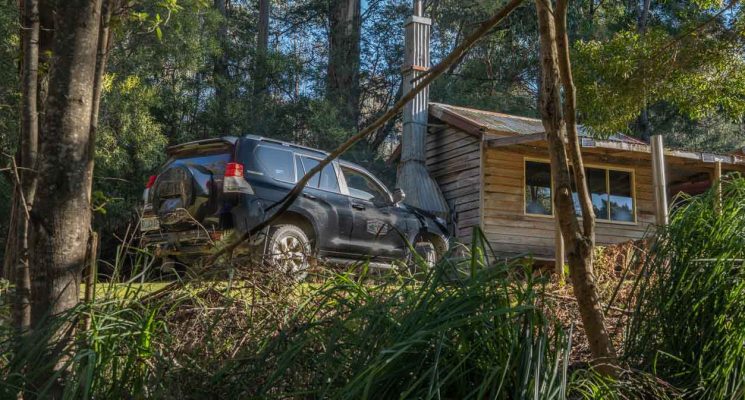 cabin and Pepper Bush tour vehicle in the bush